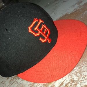 A Giants baseball hat. The size is kids 7 1/2.